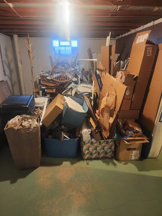 Roll-off dumpster container at job site for 4 Yard Dumpster Rental in Holladay